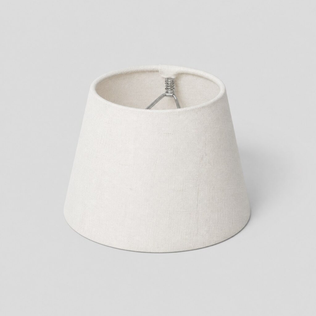Petit abat-jour conique en lin blanc de 20 cm sur fond gris clair