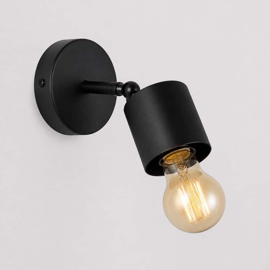Applique murale de salon en métal noir mat avec bras orientable et ampoule à filament