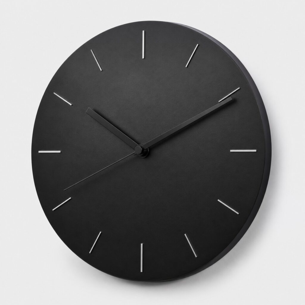 Grande horloge murale ronde de 60 cm en métal noir mat à cadran épuré